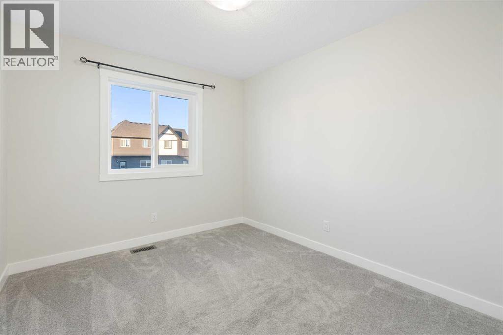 99 Edith Passage Nw, Calgary, Alberta  T3R 2B5 - Photo 30 - A2278688