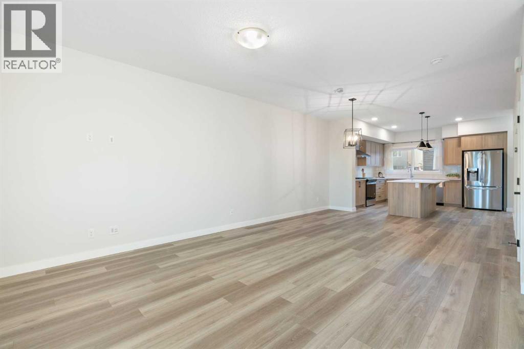 99 Edith Passage Nw, Calgary, Alberta  T3R 2B5 - Photo 7 - A2278688