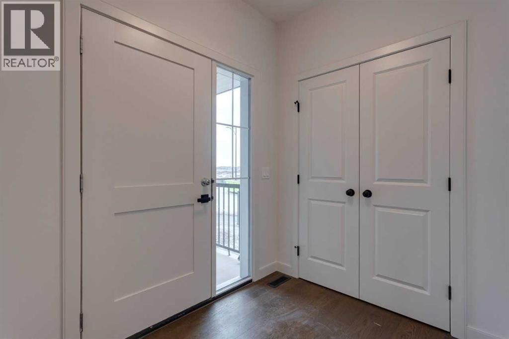 21 Bayview Mews Sw, Airdrie, Alberta  T4B 4G2 - Photo 3 - A2243336