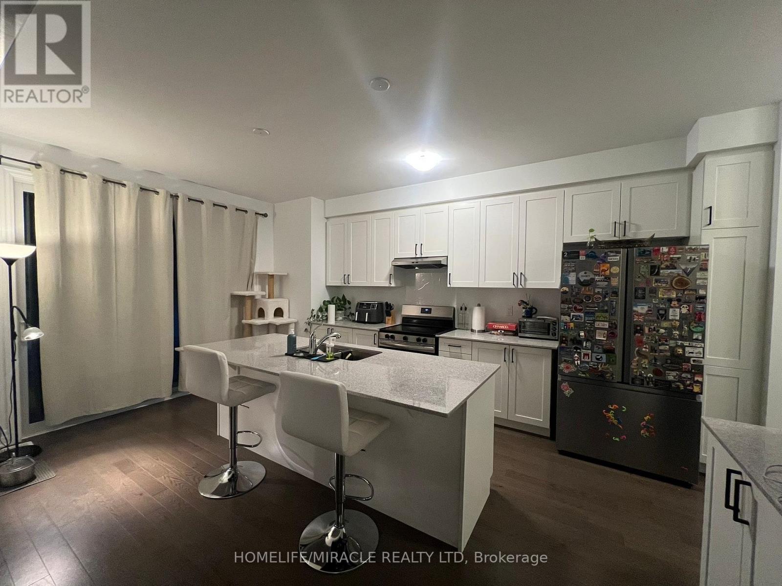 1307 Lily Crescent, Milton, Ontario  L9E 2B7 - Photo 9 - W12703514