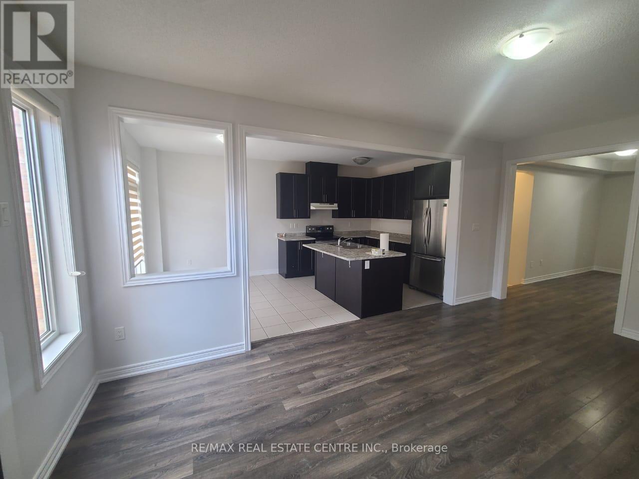 100 Truro Circle, Brampton, Ontario  L7A 4E7 - Photo 5 - W12703572