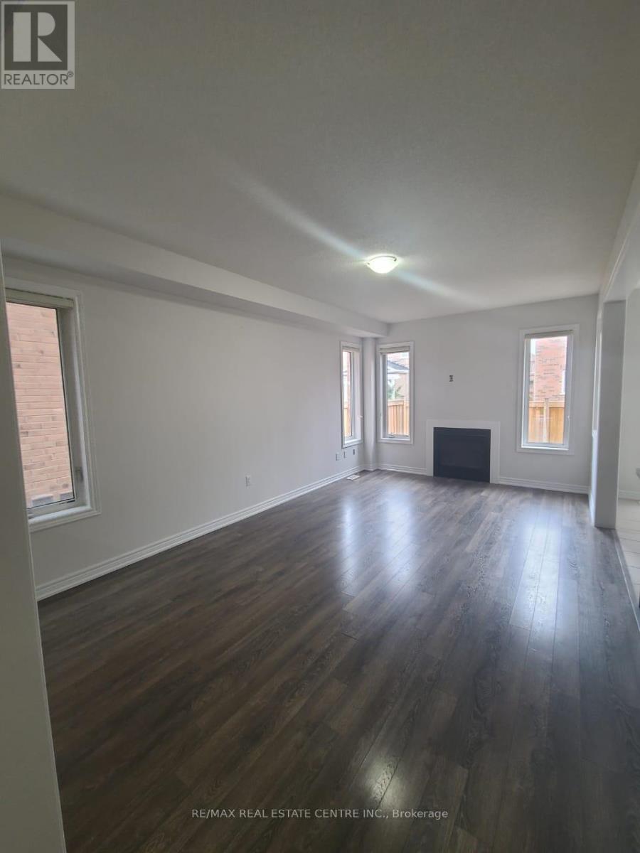 100 Truro Circle, Brampton, Ontario  L7A 4E7 - Photo 7 - W12703572