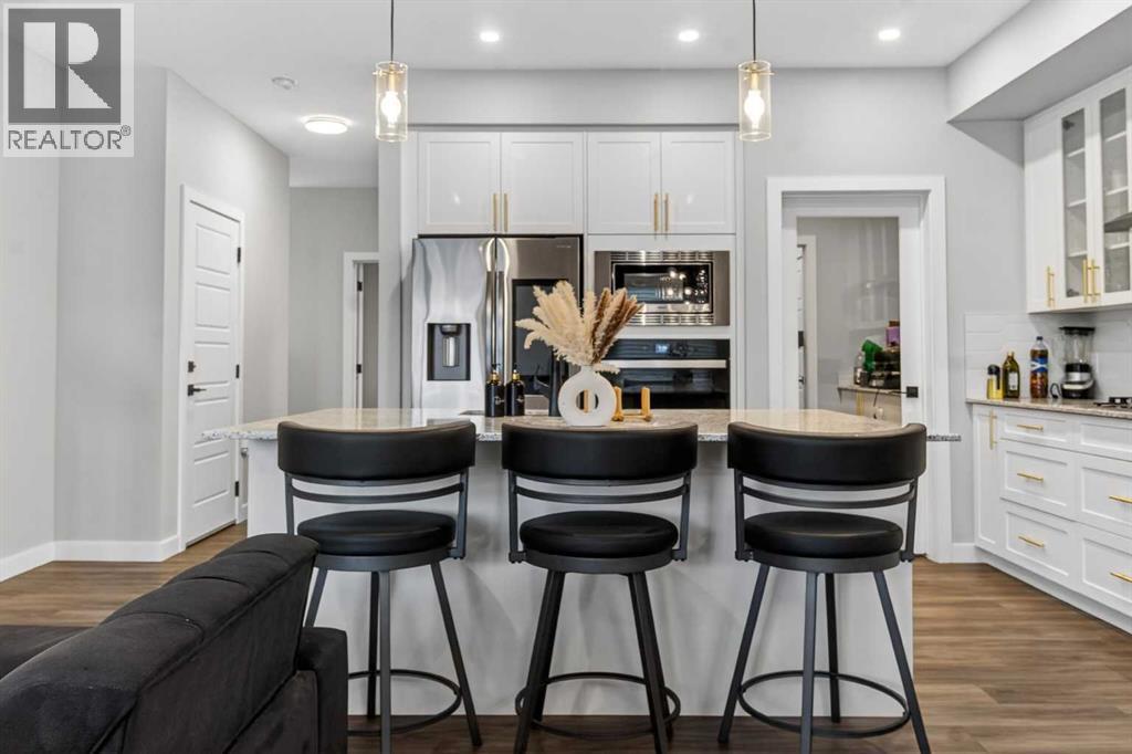 66 Belmont Manor Sw, Calgary, Alberta  T2X 5E4 - Photo 6 - A2277469