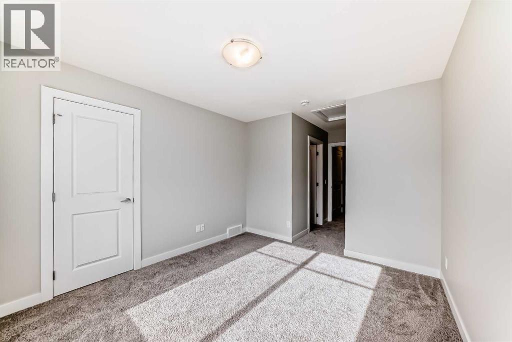 710 Sage Hill Grove Nw, Calgary, Alberta  T3R 2A2 - Photo 11 - A2261479