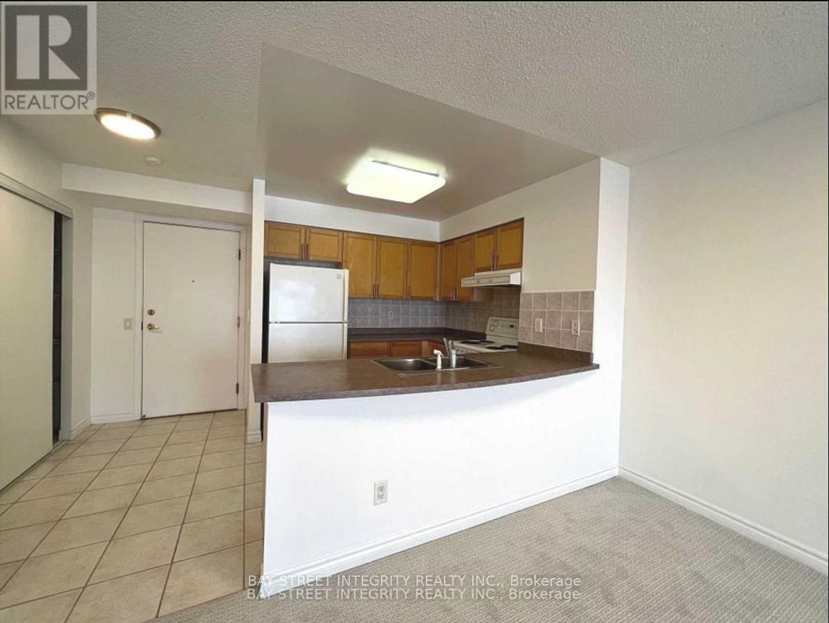 1516 - 25 Kingsbridge Garden Circle, Mississauga, Ontario  L5R 4B1 - Photo 5 - W12703700