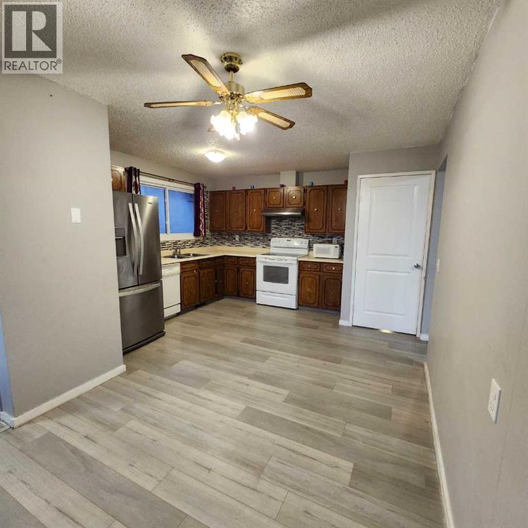 176 Whitworth  Way  Ne, Calgary, Alberta  T1Y 6A9 - Photo 3 - A2279700