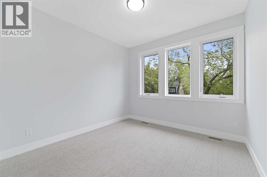 107 Hartford Road Nw, Calgary, Alberta  T2K 2A7 - Photo 26 - A2279523