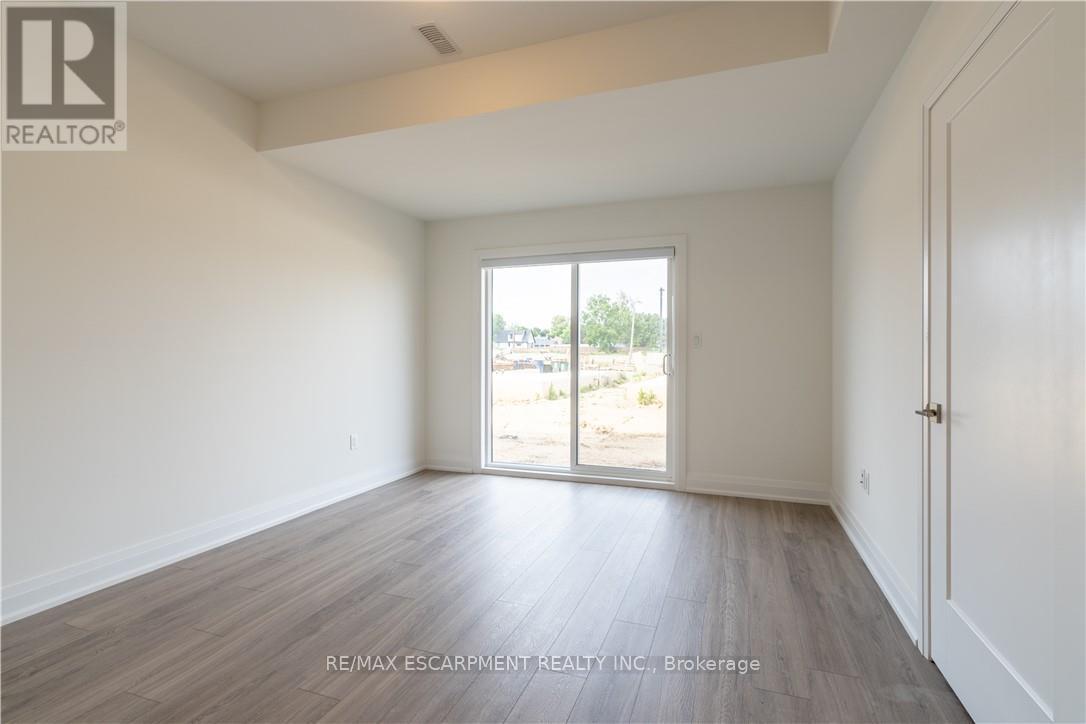 15 Raspberry Lane, Hamilton, Ontario  L0R 1W0 - Photo 10 - X12704504