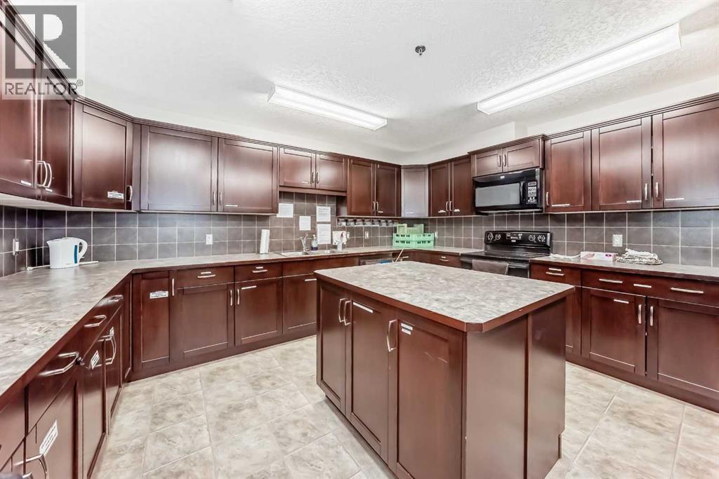 415, 77 George Fox Trail, Cochrane, Alberta  T4C 0N1 - Photo 35 - A2278980