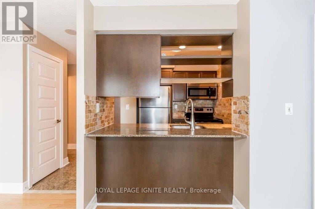 2105 - 215 Queen Street E, Brampton, Ontario  L6W 0A9 - Photo 4 - W12704542