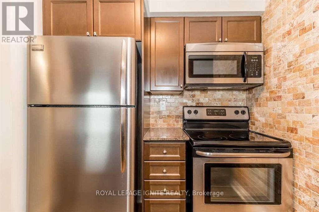 2105 - 215 Queen Street E, Brampton, Ontario  L6W 0A9 - Photo 5 - W12704542