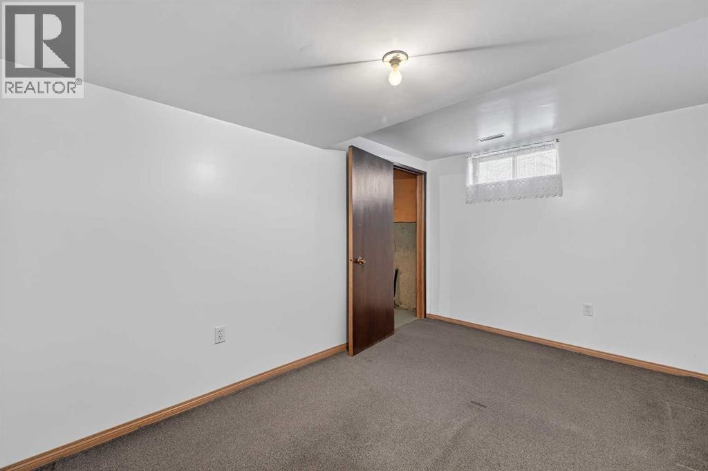 7228 Huntridge Hill Ne, Calgary, Alberta  T2K 4A5 - Photo 20 - A2279509