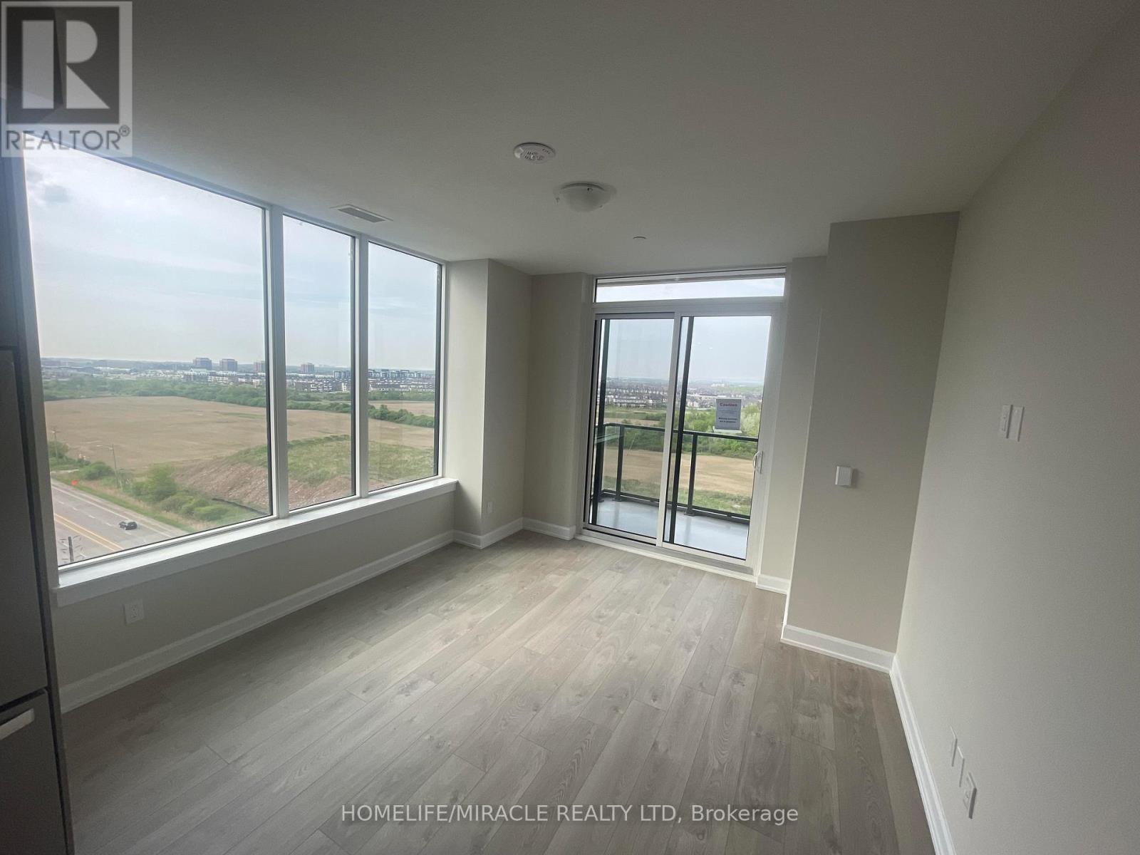 1205 - 3220 William Coltson Avenue, Oakville, Ontario  L6H 7X9 - Photo 3 - W12705230