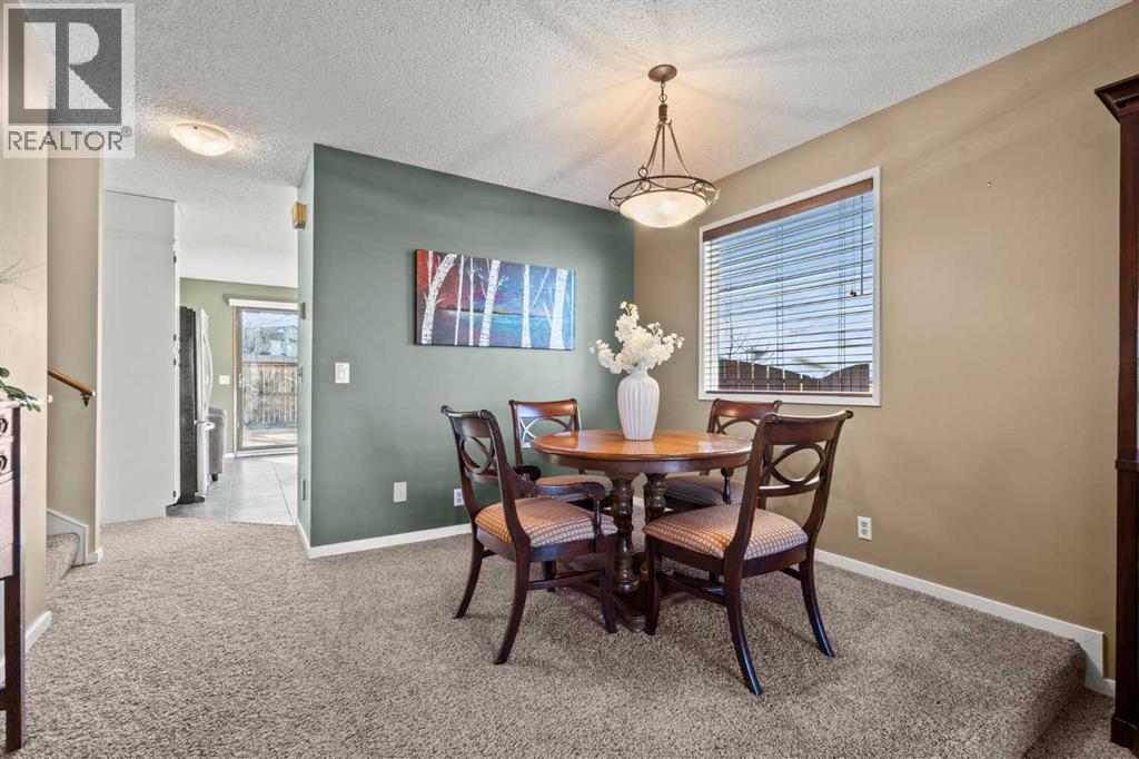 15 Beacham Rise Nw, Calgary, Alberta  T3K 1S1 - Photo 7 - A2279233