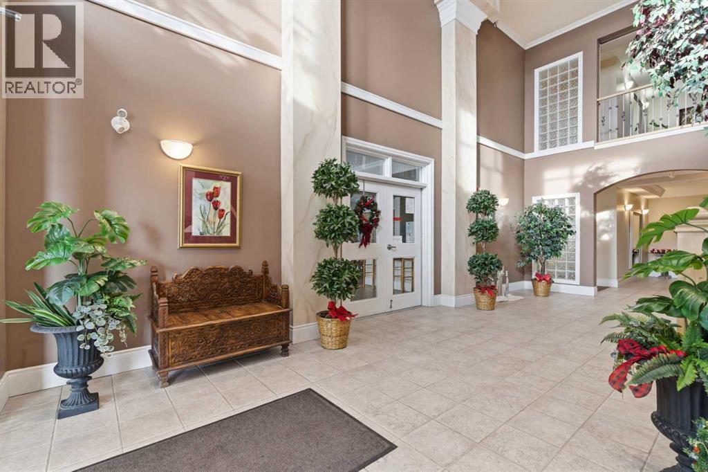 1302, 1010 Arbour Lake Road Nw, Calgary, Alberta  T3G 4Y8 - Photo 4 - A2273131