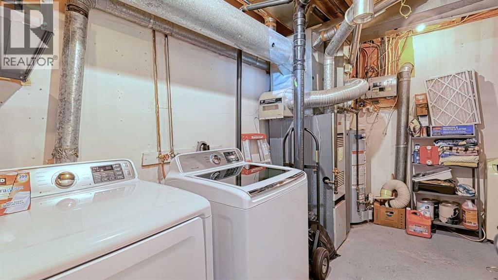 152 Oaktree Lane Sw, Calgary, Alberta  T2V 4E4 - Photo 23 - A2279714