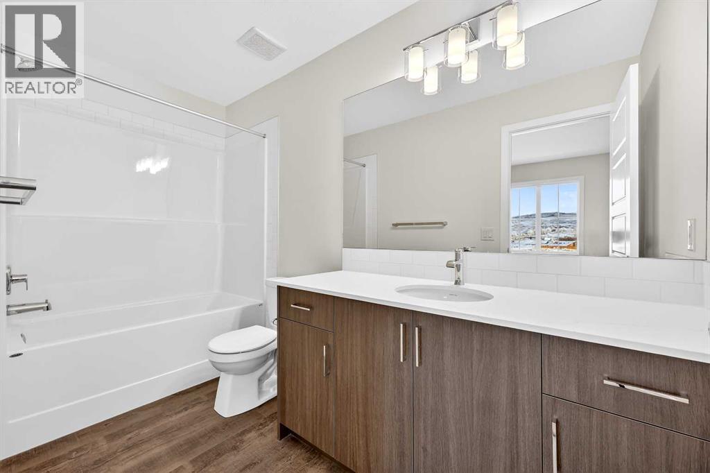 92 Creekside Drive Sw, Calgary, Alberta  T2X 6E2 - Photo 27 - A2279434