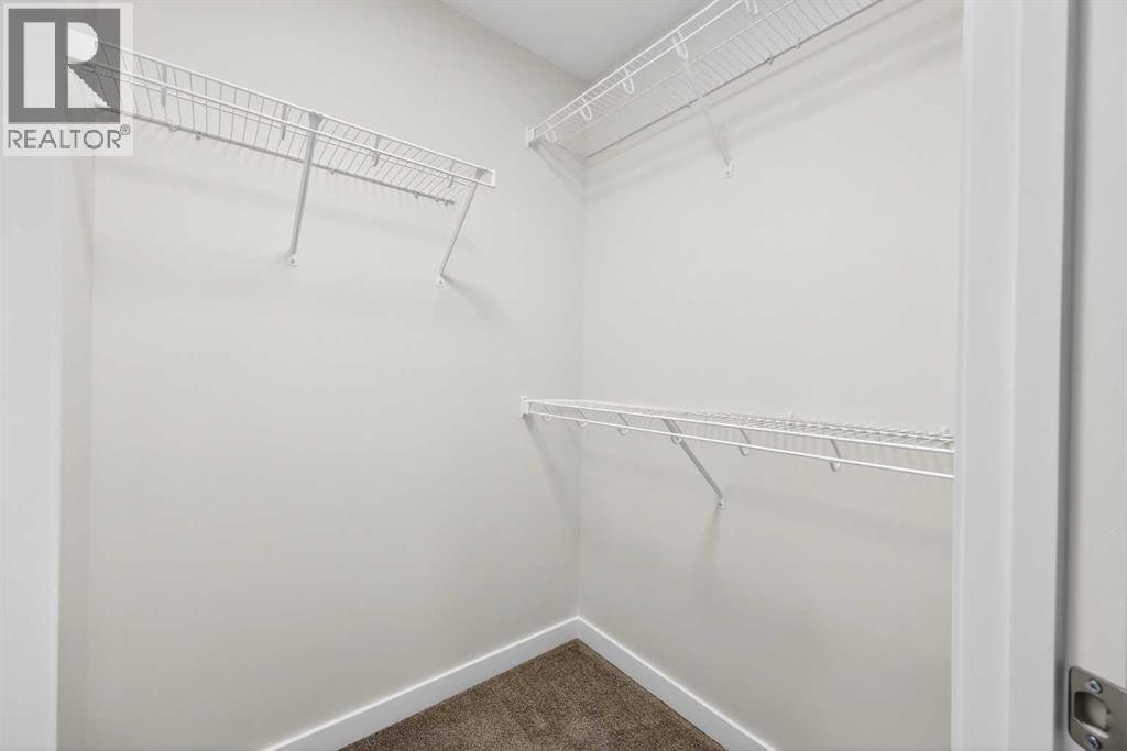 92 Creekside Drive Sw, Calgary, Alberta  T2X 6E2 - Photo 28 - A2279434