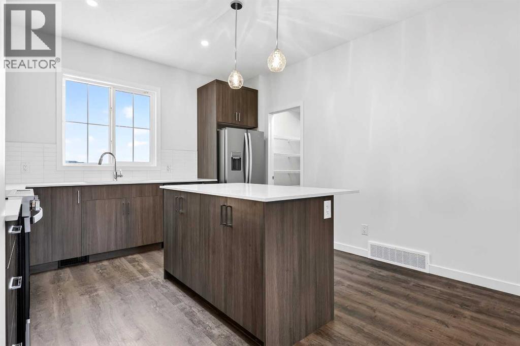 92 Creekside Drive Sw, Calgary, Alberta  T2X 6E2 - Photo 15 - A2279434