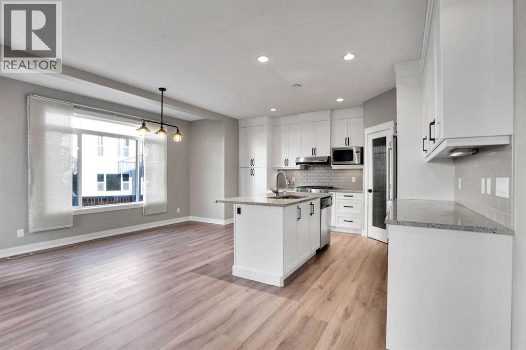 179 Panatella Cape Nw, Calgary, Alberta  T3K 0W3 - Photo 4 - A2279943