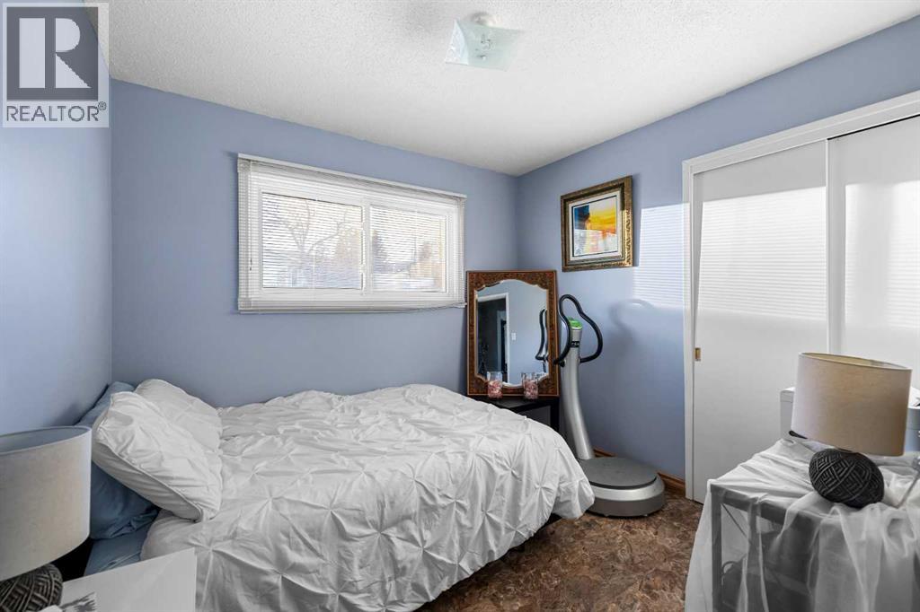 1016 Hunterdale Place Nw, Calgary, Alberta  T2Z 4R7 - Photo 16 - A2279676