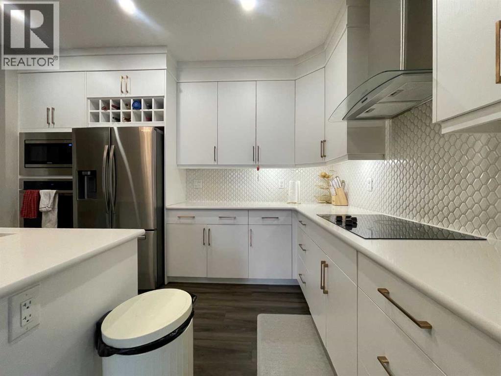 220 Carringham Road Nw, Calgary, Alberta  T3P 1V4 - Photo 7 - A2278406