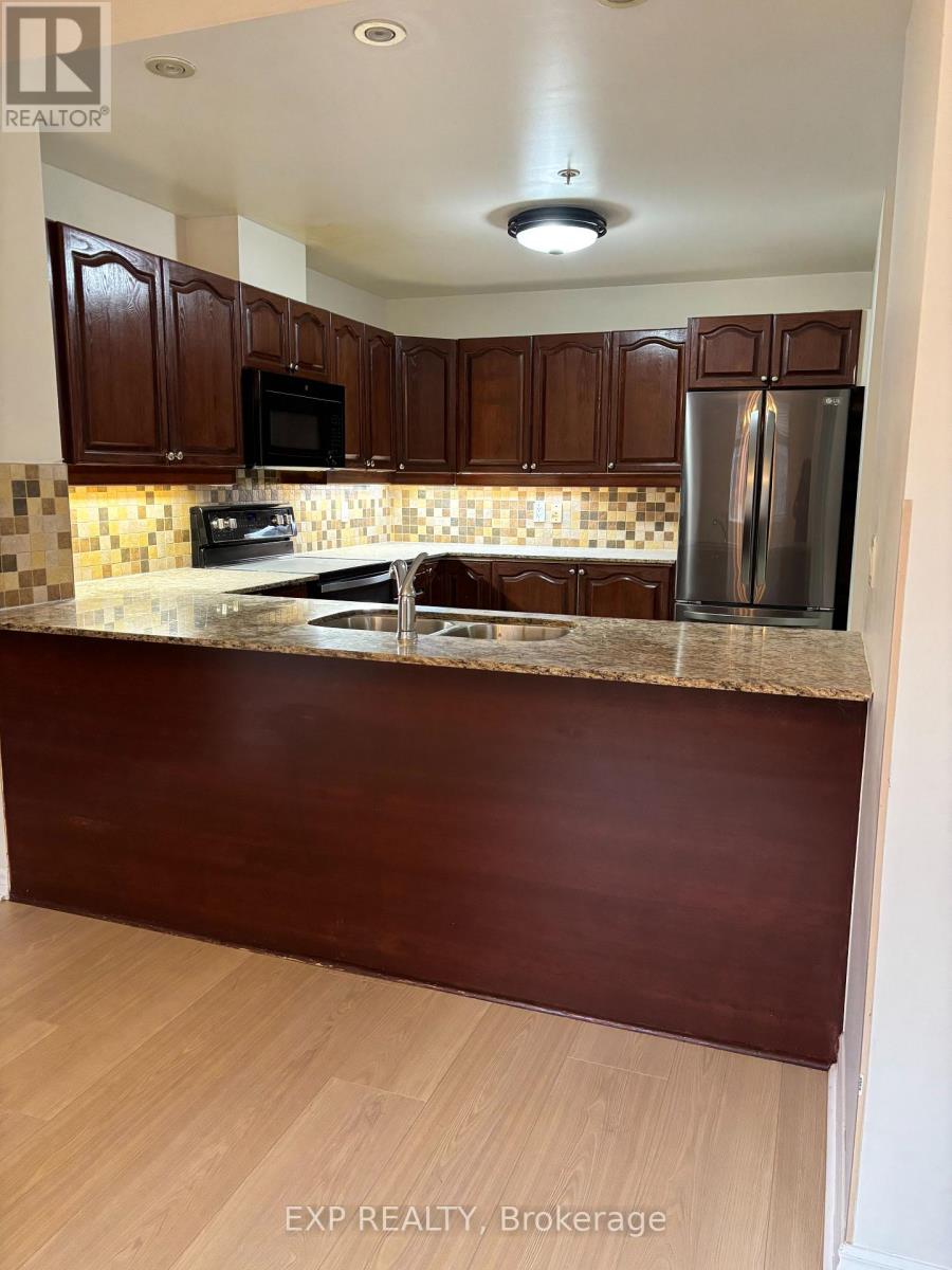 202 - 350 Princess Royal Drive, Mississauga, Ontario  L5B 4N1 - Photo 4 - W12705788