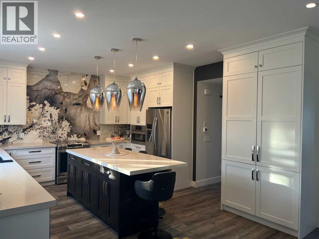 9927 Scurfield Drive Nw, Calgary, Alberta  T3L 1V9 - Photo 19 - A2279729