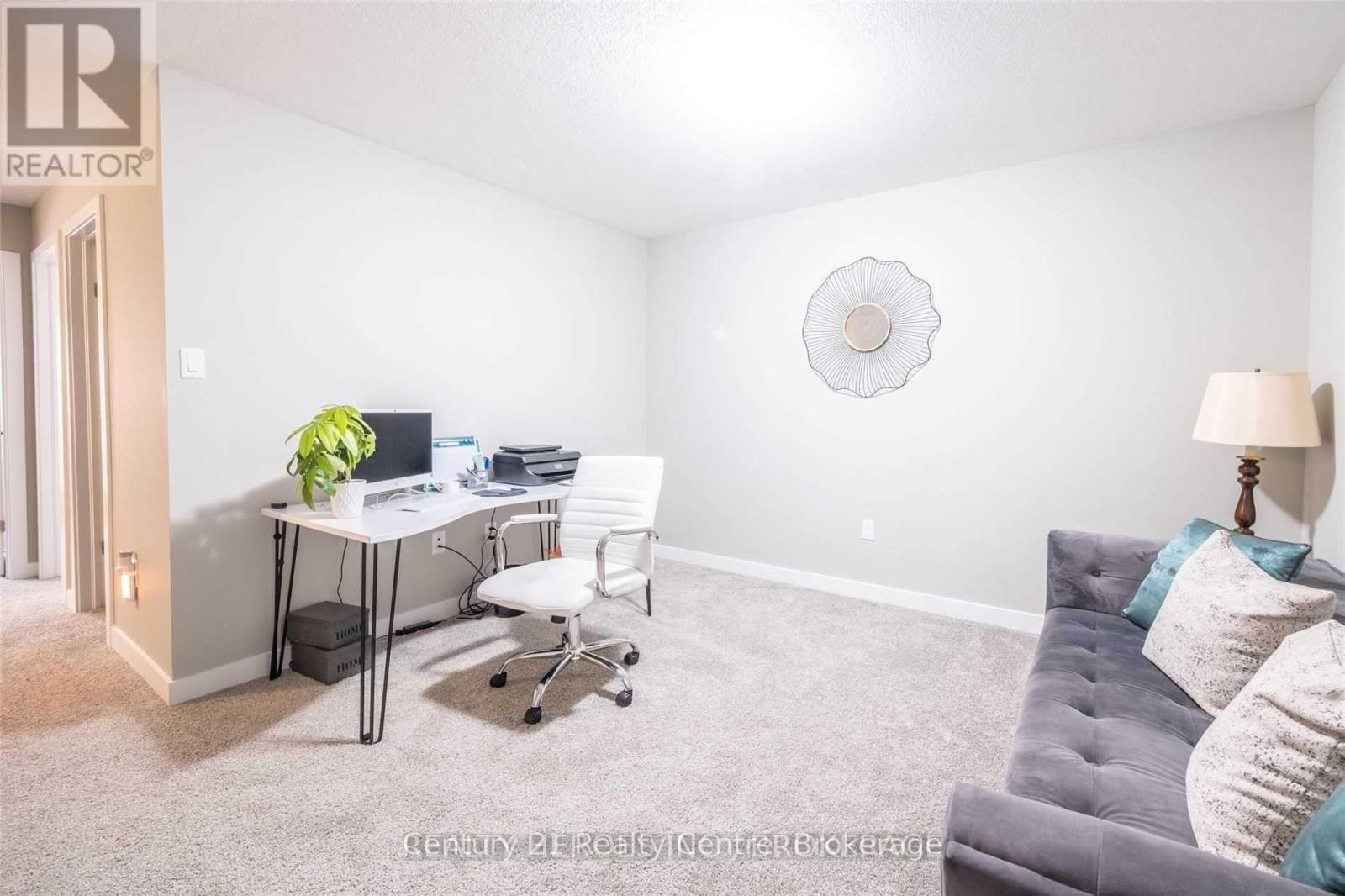 915 Robert Ferrie Drive, Kitchener, Ontario  N2R 0P2 - Photo 5 - X12706098