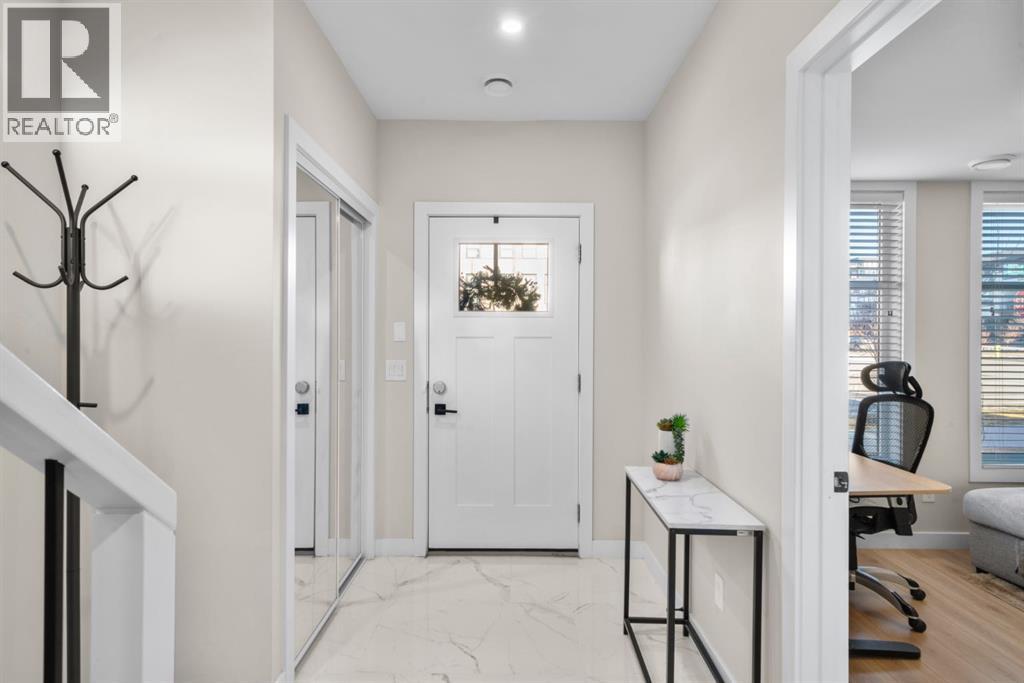 7813 Spring Willow Drive Sw, Calgary, Alberta  T3H 6C9 - Photo 5 - A2279709