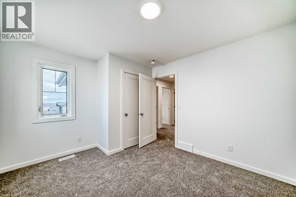 44 Creekside Path Sw, Calgary, Alberta  T2X 5W1 - Photo 32 - A2279491