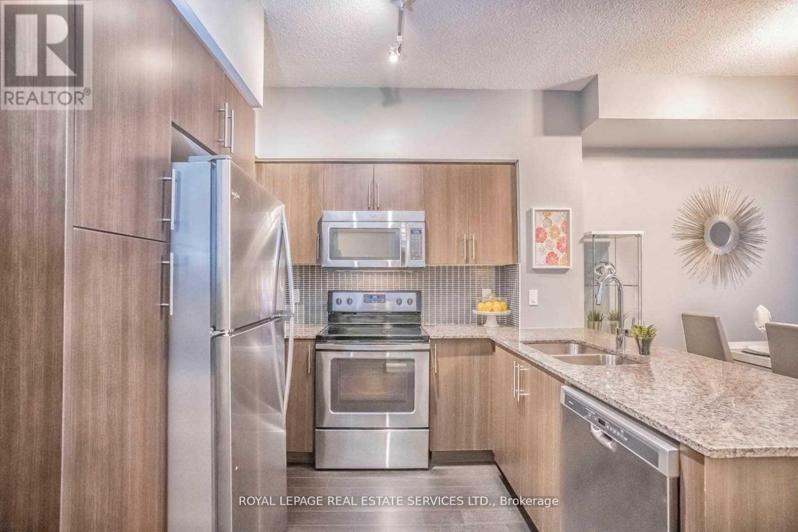 1504 - 65 Speers Road, Oakville, Ontario  L6K 3V5 - Photo 5 - W12706222