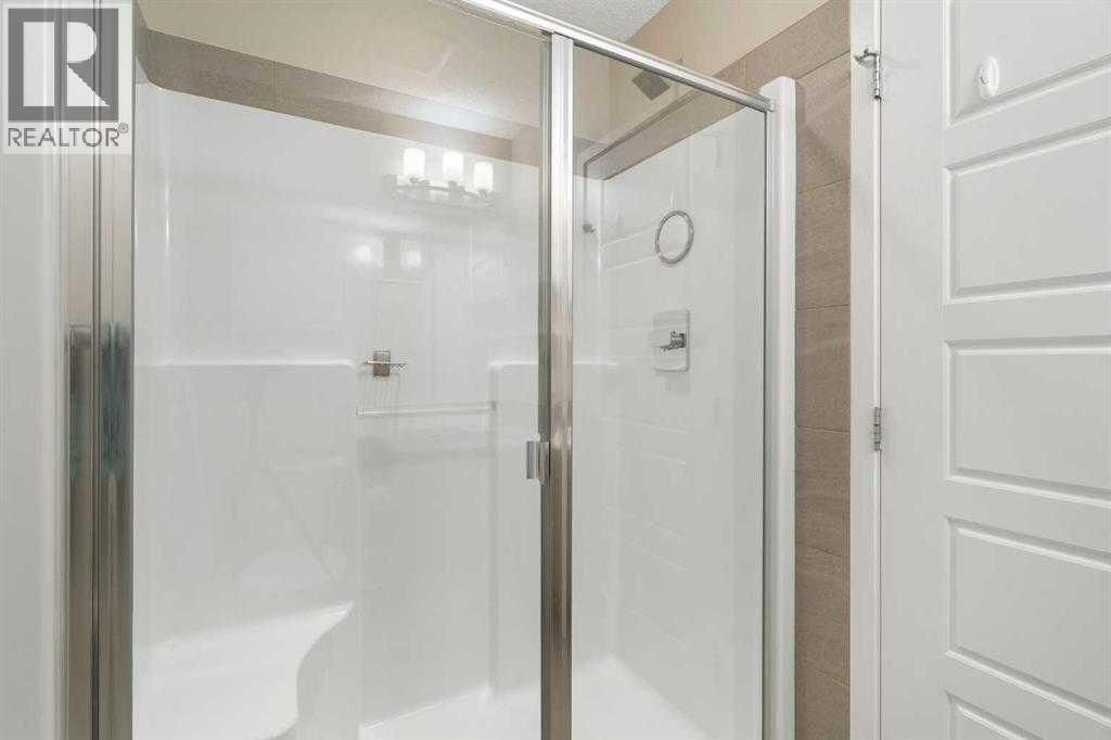 228 New Brighton Walk Se, Calgary, Alberta  T2Z 5C7 - Photo 22 - A2277539