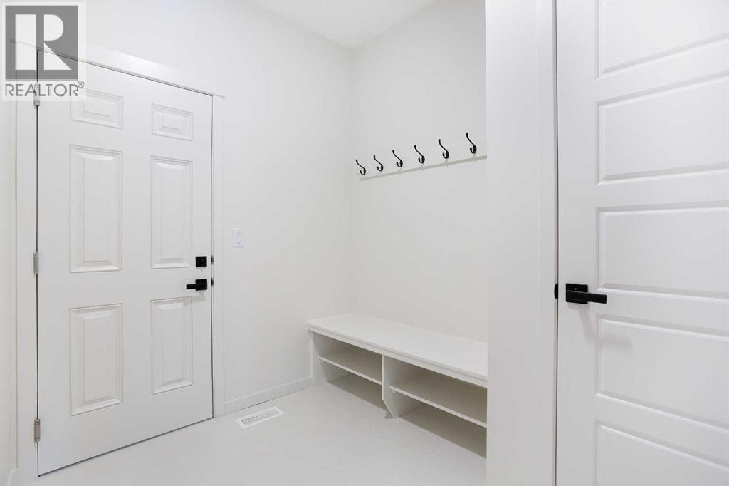 65 Creekside Passage Sw, Calgary, Alberta  T2X 5V6 - Photo 15 - A2279253