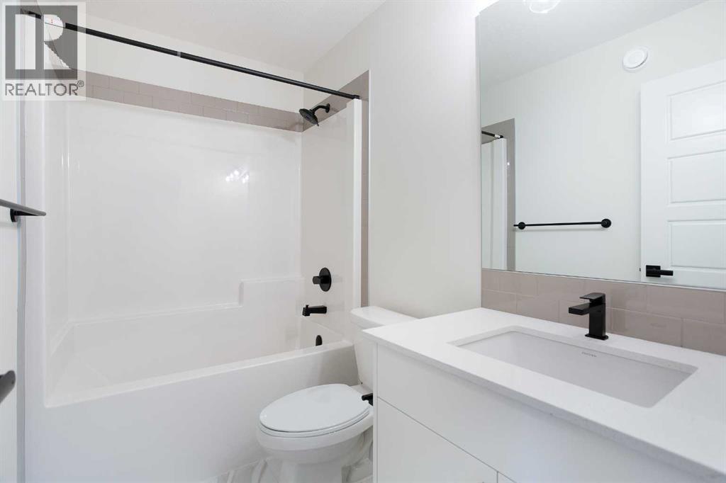 65 Creekside Passage Sw, Calgary, Alberta  T2X 5V6 - Photo 18 - A2279253