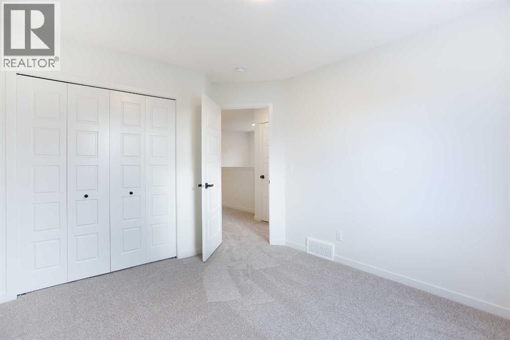 65 Creekside Passage Sw, Calgary, Alberta  T2X 5V6 - Photo 26 - A2279253