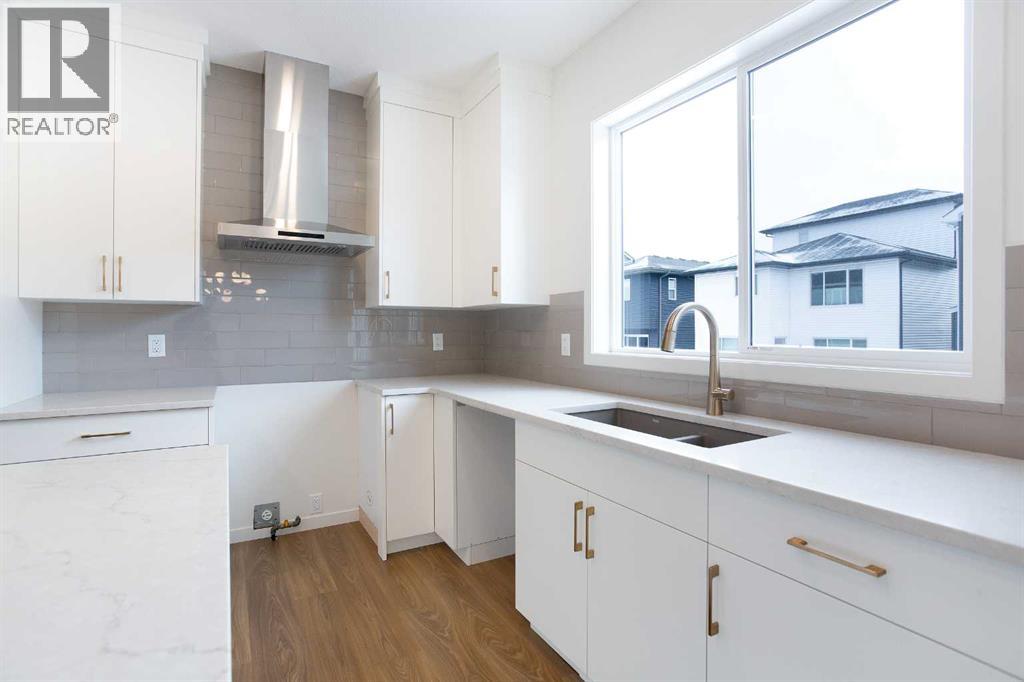 65 Creekside Passage Sw, Calgary, Alberta  T2X 5V6 - Photo 5 - A2279253