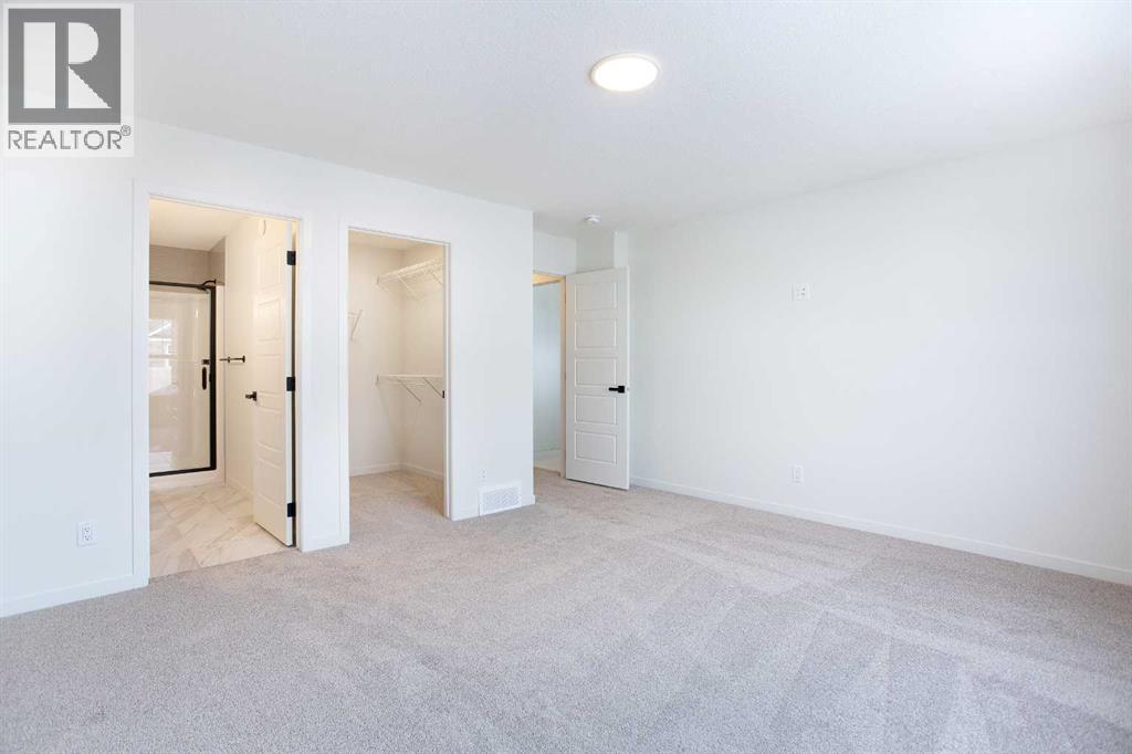 65 Creekside Passage Sw, Calgary, Alberta  T2X 5V6 - Photo 22 - A2279253