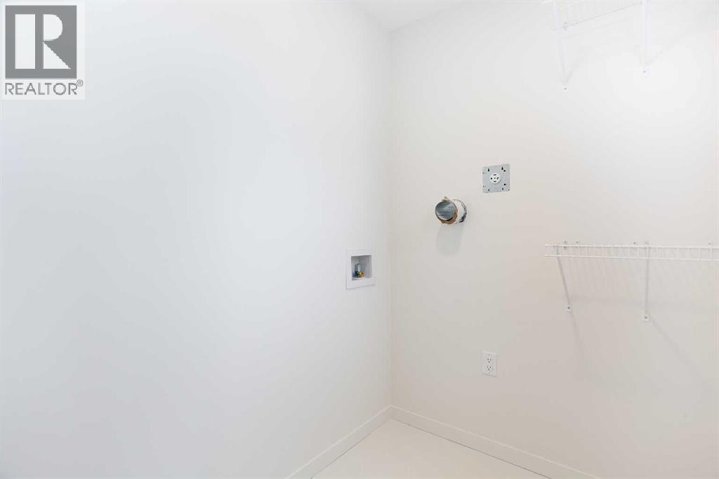 65 Creekside Passage Sw, Calgary, Alberta  T2X 5V6 - Photo 19 - A2279253