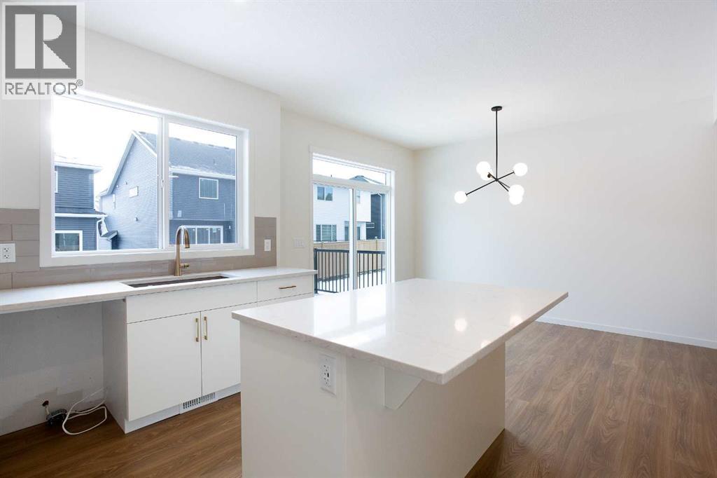 65 Creekside Passage Sw, Calgary, Alberta  T2X 5V6 - Photo 6 - A2279253