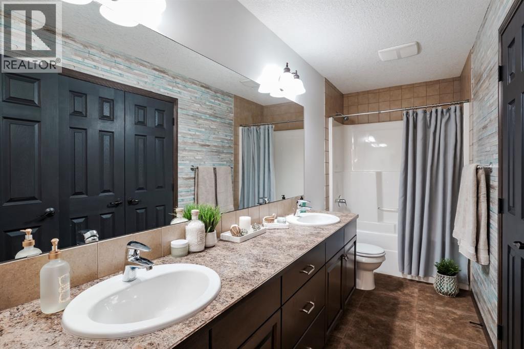 203 Sunset Circle, Cochrane, Alberta  T4C 0C8 - Photo 32 - A2277554