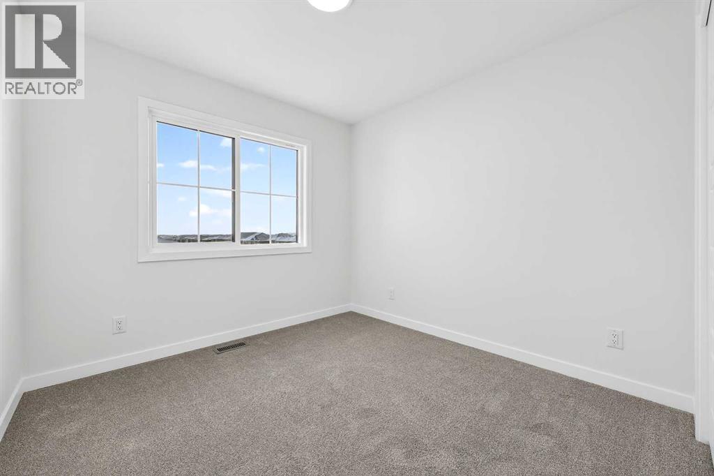 92 Creekside Drive Sw, Calgary, Alberta  T2X 6E2 - Photo 29 - A2279434