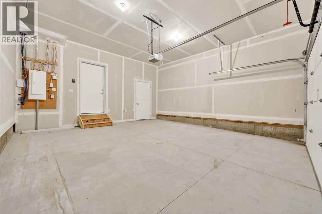 92 Creekside Drive Sw, Calgary, Alberta  T2X 6E2 - Photo 34 - A2279434