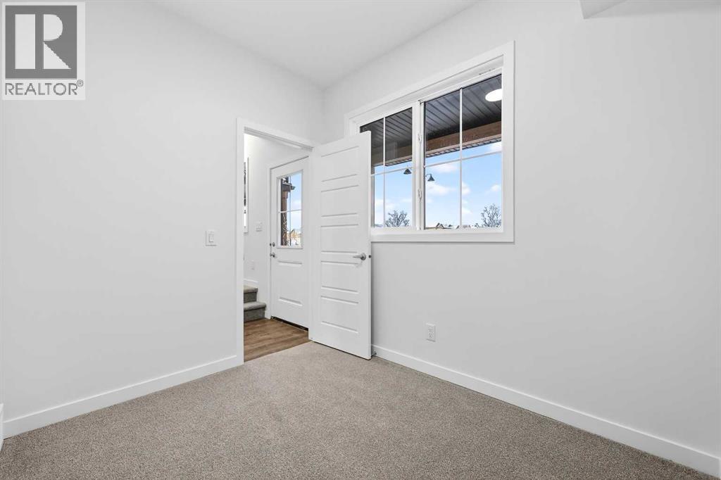 92 Creekside Drive Sw, Calgary, Alberta  T2X 6E2 - Photo 9 - A2279434