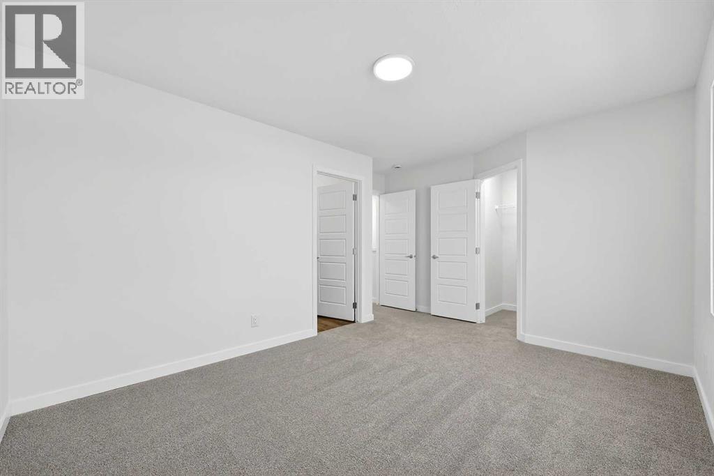 92 Creekside Drive Sw, Calgary, Alberta  T2X 6E2 - Photo 25 - A2279434