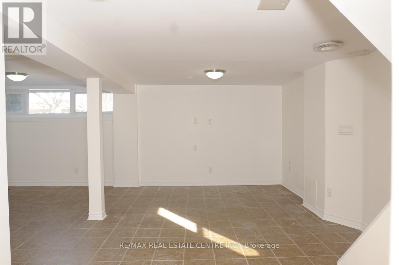 Lower Level - 22 Hollister Road, Toronto, Ontario  M9C 4M7 - Photo 4 - W12706694