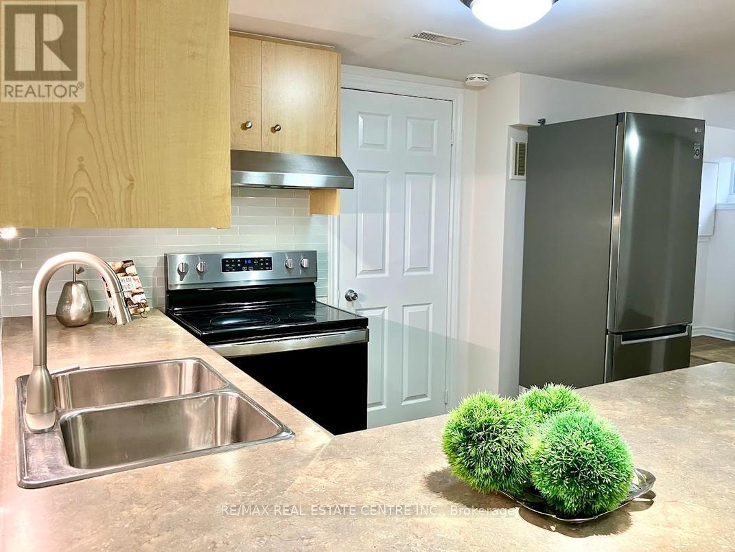 Lower Level - 22 Hollister Road, Toronto, Ontario  M9C 4M7 - Photo 5 - W12706694