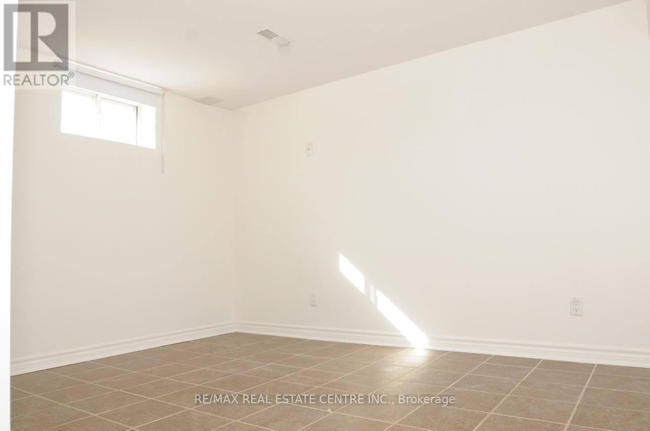 Lower Level - 22 Hollister Road, Toronto, Ontario  M9C 4M7 - Photo 6 - W12706694