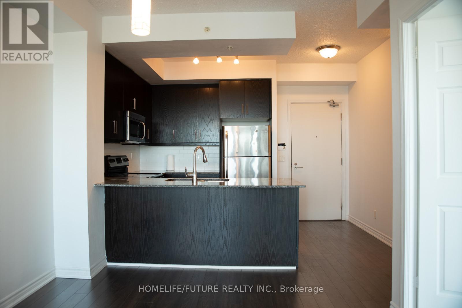 1029 - 15 James Finlay Way, Toronto, Ontario  M3M 0B3 - Photo 4 - W12706726