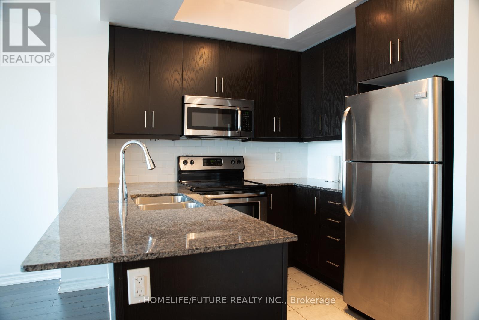 1029 - 15 James Finlay Way, Toronto, Ontario  M3M 0B3 - Photo 5 - W12706726